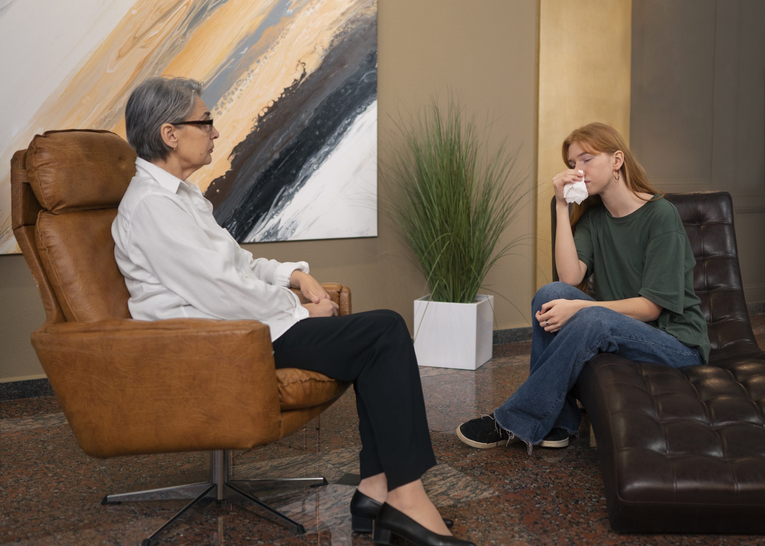 authentic-scene-young-person-undergoing-psychological-therapy